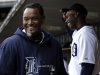 Detroit Tigers relief pitcher Jose Valverde, left, laughs with Torii Hunter in the dugout before a baseball game against the Kansas City Royals in Detroit, Wednesday, April 24, 2013. (AP Photo/Paul Sancya)