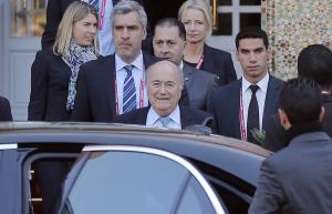 FIFA president Sepp Blatter, center, leaves a hotel&nbsp;&hellip;
