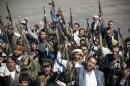 Houthi Shiite Yemenis hold their weapons during a rally to show support for their comrades in Sanaa, Yemen, Wednesday, Feb. 4, 2015. (AP Photo/Hani Mohammed)