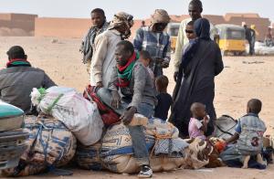 West African migrants returning from Libya sit with&nbsp;&hellip;