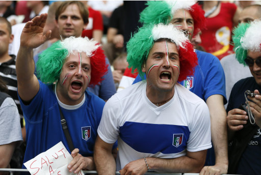Supporters of Italy's national team cheer prior to the Euro 2012 soccer championship Group C match between Spain and Italy in Gdansk, Poland, Sunday, June 10, 2012. (AP Photo/Michael Sohn)