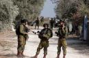 Israeli soldiers on November 13, 2013, during a search operation in the West Bank town of Jenin