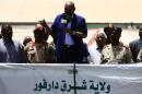 Sudanese President Omar al-Bashir (C) delivers a speech to the crowd during a visit to El Daein in Eastern Darfur on April 5, 2016