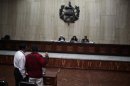 A indigenous man of the Ixchil region takes an oath during his testimony at the trial of former Guatemalan dictator Rios Montt in Guatemala City
