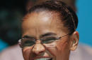 Marina Silva, presidential candidate of the Brazilian Socialist Party, PSB, who finished third in the first-round of Brazil's presidential election, smiles during a news conference in Sao Paulo, Brazil, Sunday, Oct. 12, 2014. Silva gave her endorsement Sunday to the leading opposition candidate Aecio Neves in the runoff with President Dilma Rousseff set for Oct. 26. (AP Photo/Andre Penner)