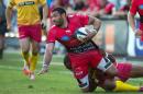 Toulon's winger Bryan Habana is tackled during a match against the Llanelli Scarlets in Toulon, France, October 19, 2014
