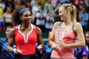 Serena Williams of the U.S., left, after her tennis victory against Maria Sharapova of Russia, right, on the final of the WTA Championships in Istanbul, Turkey, Sunday, Oct. 28, 2012. (AP Photo)