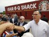 Republican presidential candidate and former Massachusetts Gov. Mitt Romney campaigns at Stepto's BBQ Shack in Evansville, Ind., Saturday, Aug. 4, 2012. (AP Photo/Charles Dharapak)