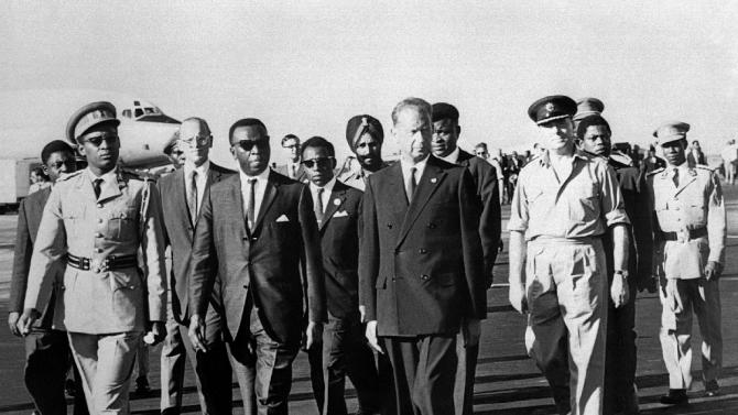 Secretary-General of the United Nations Dag Hammarskjold (3L) arrives in then-Leopoldville, Congo on September, 13 1961, five days before his death in a plane crash