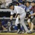 New York Yankees' Suzuki runs past Texas Rangers' Scheppers after he hit a walk-off home run to win their MLB American League game in New York