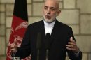 Afghan President Karzai speaks during a joint news conference in Kabul