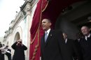 President Barack Obama arrives on the West Front of the Capitol in Washington, Monday, Jan. 21, 2013, for his ceremonial swearing-in ceremony during the 57th Presidential Inauguration. (AP Photo/Win McNamee, Pool)