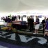 Football fans file past the casket of former Baltimore Ravens owner Art Modell during a public viewing at M&T Bank Stadium in Baltimore,  Saturday, Sept. 8, 2012. Modell died Sept. 6. He was 87.  (AP Photo/Steve Ruark)