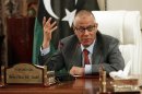 Libya's Prime Minister Ali Zeidan speaks during a joint news conference in Tripoli