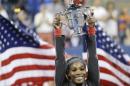 FILE - In this Sept. 8, 2013, file photo, Serena Williams, of the United States, holds up the championship trophy after defeating Victoria Azarenka, of Belarus, during the women's singles final of the U.S. Open tennis tournament in New York. Williams is The Associated Press' 2013 Female Athlete of the Year, easily winning a vote by news organizations. (AP Photo/David Goldman, File)
