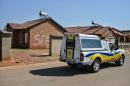 A police van patrols in front of the house where Orlando Pirate and Bafana Bafana goalkeeper Senzo Meyiwa was murdered, October 27, 2014 in Johannesburg, South Africa