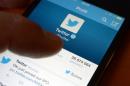 File picture shows an official Twitter account on a smartphone