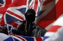Loyalist protesters demonstrate against restrictions on flying Britain's union flag from Belfast City Hall in central Belfast