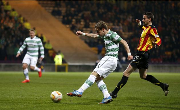 Celtic&#39;s Stefan Johansen scores against Partick Thistle during their Scottish Premier League soccer match at Firhill Stadium in Glasgow