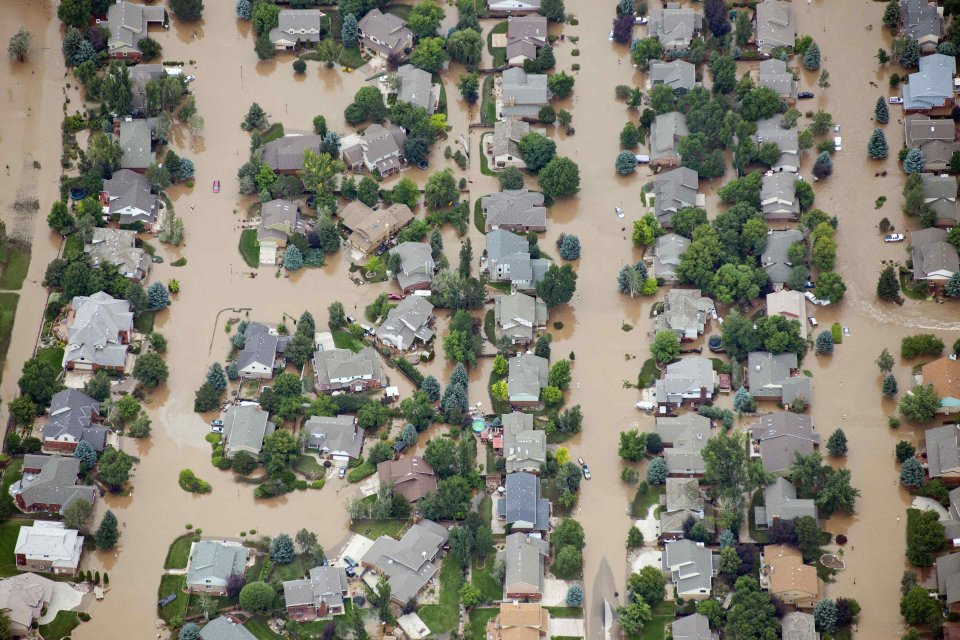 An aerial view of suburban streets flooded in Longmont