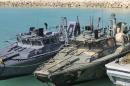 This picture released by the Iranian Revolutionary Guards on Wednesday, Jan. 13, 2016, shows detained American Navy sailors' boats in custody of the guards in the Persian Gulf Iran. Less than a day after 10 U.S. Navy sailors were detained in Iran when their boats drifted into Iranian waters, they and their vessels were back safely Wednesday with the American fleet. (Sepahnews via AP)