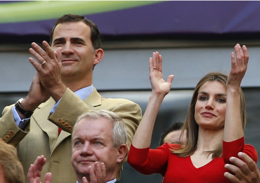 Spain's Crown Prince Felipe and Princess Letizia applaud at the start of Group C Euro 2012 soccer match between Spain and Italy in Gdansk