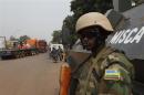 African peace keeping soldiers escort a humanitarian convoy in Bangui