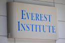 FILE - This July 8, 2014 file photo shows an Everest Institute sign on an office building in Silver Spring, Md. Everest is one of the 28 remaining ground college campuses Corinthian Colleges will shut down, displacing about 16,000 students. The announcement comes less than two weeks after the U.S. Department of Education announced it was fining the for-profit institution $30 million for misrepresentation. In a statement Sunday, April 26, 2015 the Santa Ana, California-based company said it was working with other schools to help students continue their education. The closures include Heald College campuses in California, Hawaii and Oregon, as well as Everest and WyoTech schools in California, Arizona and New York. (AP Photo/Jose Luis Magana, File)