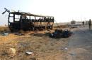 A picture uploaded on the official Facebook page of the Egyptian army spokesperson on November 20, 2013 shows a burnt-out army bus following a car bomb attack in North Sinai's provincial capital Al-Arish