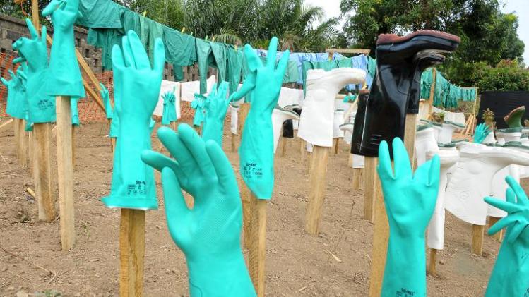 A view of gloves and boots used by medical staff drying in the sun at a centre for victims of the Ebola virus in Guekedou, Guinea on April 1, 2014