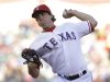 Texas Rangers starting pitcher Derek Holland throws during the fist inning of a baseball game against the Boston Red Sox on Friday, May 3, 2013, in Arlington, Texas. (AP Photo/LM Otero)