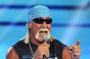 FILE - This is a Dec. 10, 2011, file photo showing Hulk Hogan at Spike TV's Video Game Awards in Culver City, Calif. Hulk Hogan was a one-man armed forces branch inside the ring, disposing the latest lumbering threats from Cold War Russia, Iran and even an Iraqi sympathizer with nothing more than a big boot to the face and a legdrop. Hogan, the biggest star in WWE history, never lost sight of the work performed by real American troops around the world who served their country in a far more hostile environment than the squared circle. (AP Photo/Chris Pizzello, File)