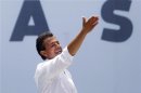 Enrique Pena Nieto, presidential candidate of the opposition PRI, gestures during his arrival to attend a rally at the Azteca stadium in Mexico City