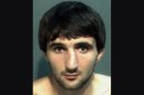 This May 4, 2013 police photo provided by the Orange County Corrections Department in Orlando, Fla., shows Ibragim Todashev after his arrest for aggravated battery in Orlando. Todashev, who was being questioned in Orlando by authorities in the Boston bombing probe, was fatally shot Wednesday, May 22, 2013 when he initiated a violent confrontation, FBI officials said. (AP Photo/Orange County Corrections Department)