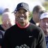 Tiger Woods poses with the trophy after winning the Farmers Insurance Open golf tournament at the Torrey Pines Golf Course, Monday, Jan. 28, 2013, in San Diego. Woods closed with an even-par 72 for a four-shot victory. (AP Photo/Gregory Bull)