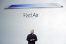 Phil Schiller, Apple's senior vice president of worldwide product marketing, introduces the new iPad Air on Tuesday, Oct. 22, 2013, in San Francisco. (AP Photo/Marcio Jose Sanchez)