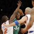 Boston Celtics forward Paul Pierce (34) looks to pass as New York Knicks guard Raymond Felton (2) defends in the second half of Game 1 of the NBA basketball playoffs in New York, Saturday, April 20, 2013. The Knicks defeated the Celtics 85-78. (AP Photo/Kathy Willens)