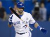Toronto Blue Jays' Jose Bautista tosses his bat after a called strike in the fifth inning of their MLB American League baseball game against the Cleveland Indians in Toronto