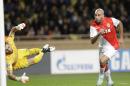 Monaco's Aymen Abdennour, right, scores the opening goal past Zenit's goalkeeper Yuri Lodygin during the Champions League Group C soccer match between Monaco and Zenit St. Petersburg at Louis II stadium in Monaco, Tuesday, Dec. 9, 2014. (AP Photo/Lionel Cironneau)