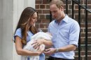 Britain's Prince William and his wife Catherine, Duchess of Cambridge appear with their baby son, as they stand outside the Lindo Wing of St Mary's Hospital, in central London
