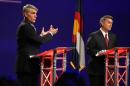 FILE - In this Oct. 15, 2014 file photo, Sen. Mark Udall, D-Colo., left, and his Republican opponent, Rep. Cory Gardner, R-Colo., face off during a televised debate at 9News in Denver. As a season of campaigning enters its final, intense weekend, a new Associated Press-GfK poll illustrates the challenge ahead for candidates and their allies trying to rally voters around traditional wedge issues such as abortion and gay marriage. This fall, voters just have other matters on their minds. (AP Photo/Brennan Linsley, File)
