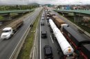 File photo of trucks lined up at Rodovia Conego Domenico Rangoni in Guaruja