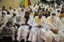 Representatives of the Azawad Movement attend the signing of the ammended version of the Algerian Accord on June 20, 2015 in Bamako