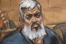 Artist's sketch of Abu Hamza al-Masri, the radical Islamist cleric facing U.S. terrorism charges, sits with his legal team in Manhattan federal court in New York