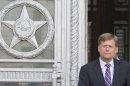 The U.S. Ambassador to Russia Michael McFaul leaves Foreign Ministry headquarters in Moscow, Russia, Wednesday, May 15, 2013. McFaul has been summoned by the Russian foreign ministry in connection with an alleged spy detention in Moscow. He entered the ministry's building in central Moscow Wednesday morning and left half an hour later without saying a word to journalists waiting outside the compound. (AP Photo/Misha Japaridze)