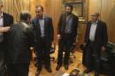Hezbollah MP Hassan Fadlallah (2nd L) accepts condolences inside Hezbollah al-Manar Television building in Beirut for the death of three Lebanese journalists working for the channel