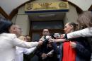 Romanian PM Ponta addressess to media as he leaves the anti-corruption agency, locally known as the DNA, in Bucharest