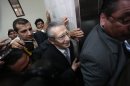 Former Guatemalan dictator Rios Montt leaves the Supreme Court of Justice, after a judge announced the decision that he will stand trial for genocide charges, in Guatemala City