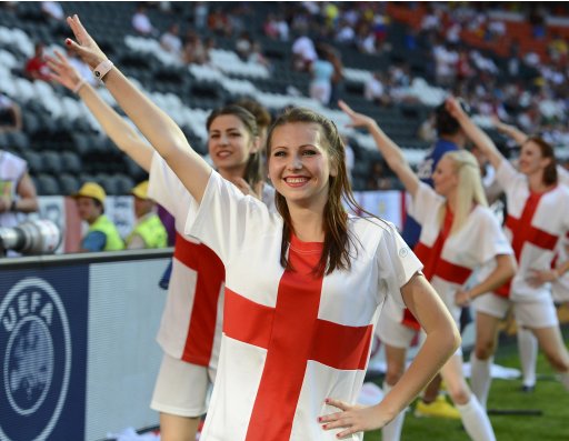 Cheerleaders wearing England's national colors perform before Group D  Euro 2012 soccer match England against France during their Euro 2012 soccer match iat Donbass Arena n Donetsk