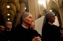Catholic nuns sit during Mass at St. Patrick's Cathedral